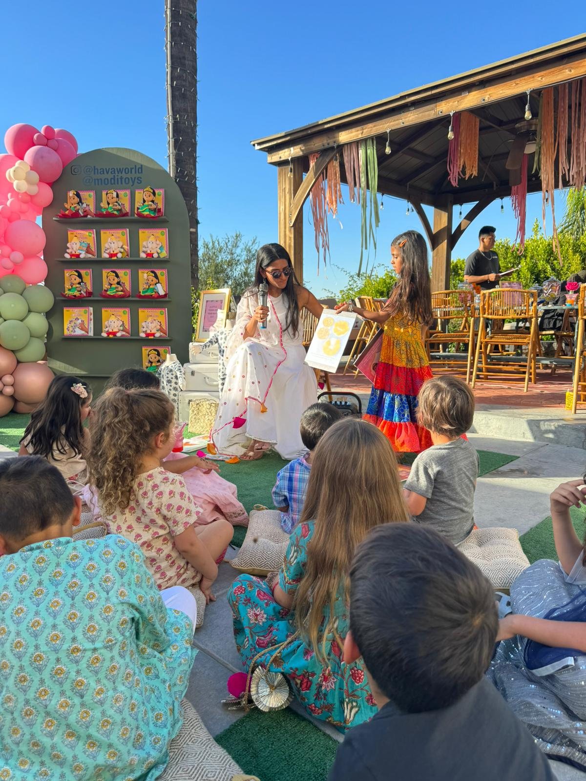 Storytime in the backyard at Diwali Play Date 2023